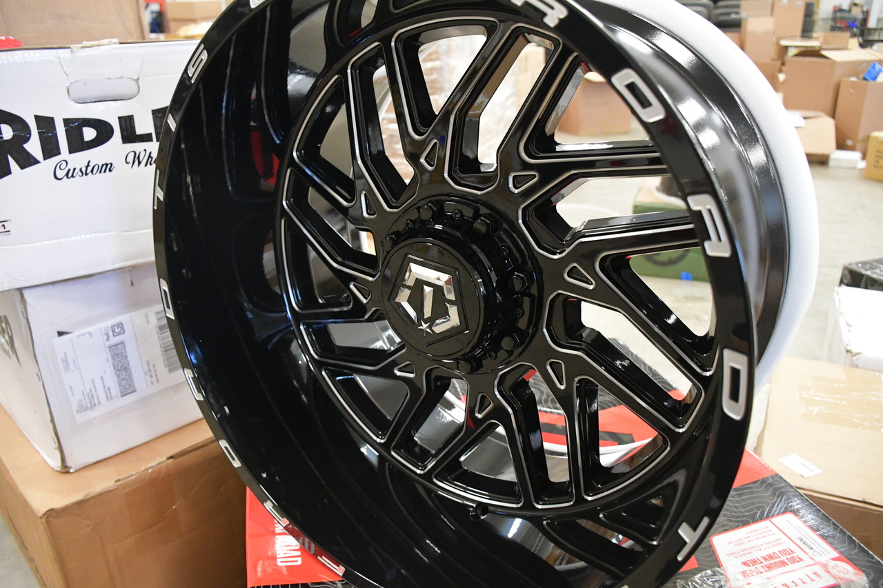 Close-up of TIS 544BM wheel finish and spoke details for custom truck builds