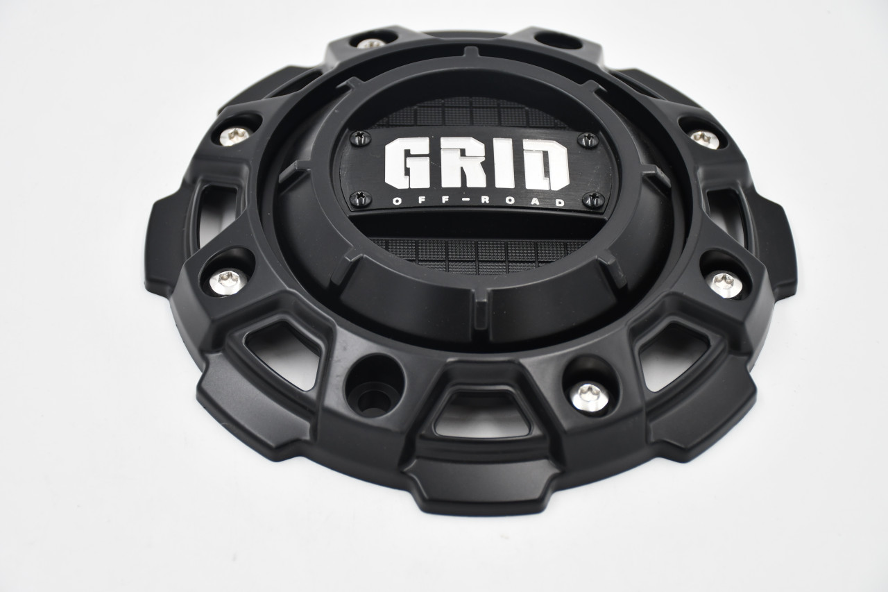 Replacement GRID Offroad black center cap GD-56-CAP with silver logo designed for GD01 through GD13 wheel styles, perfect for restoring factory wheel appearance on trucks, Jeeps, and SUVs.