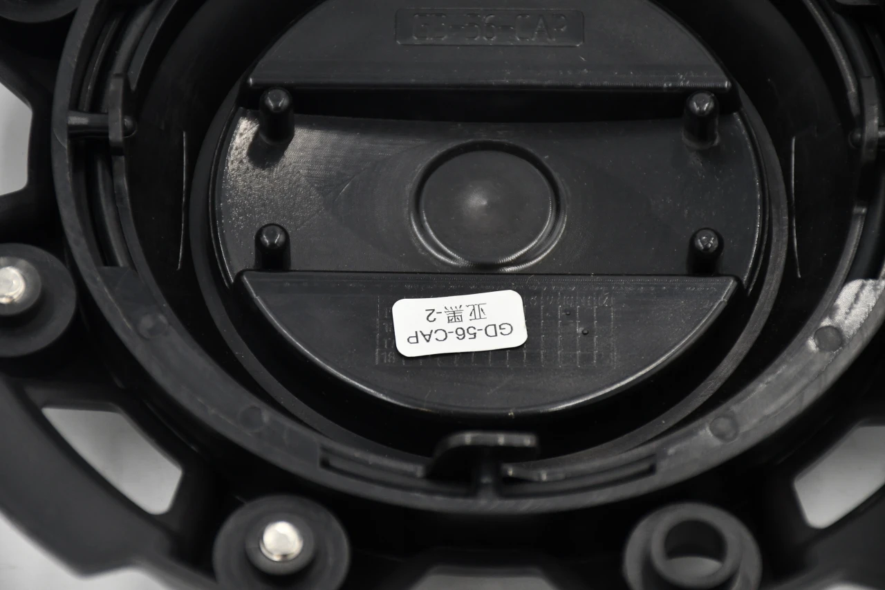 Genuine style GRID Offroad 7.75 inch wheel center cap in gloss black with silver logo for aftermarket off-road wheels, fits popular Ford, Chevy, GMC, Ram, Toyota, and Jeep wheel applications