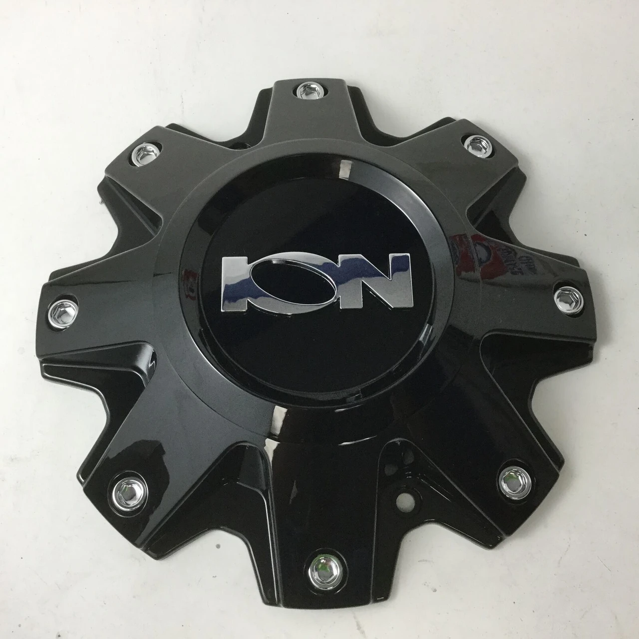 Front view of Ion Wheels C10141B black replacement wheel center cap