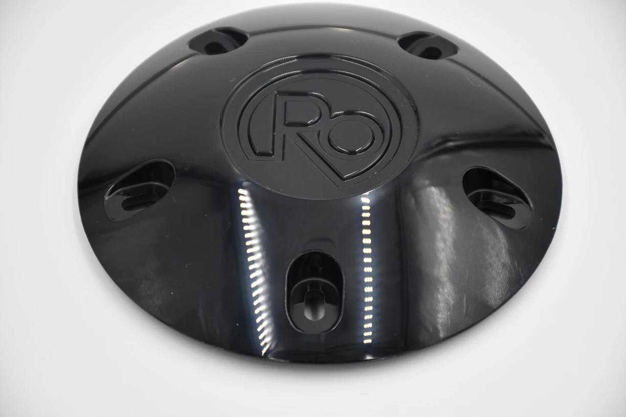 Universal black wheel center cap kit with 14mm lug-mounted system for replacing missing or discontinued caps on aftermarket and OEM wheels.