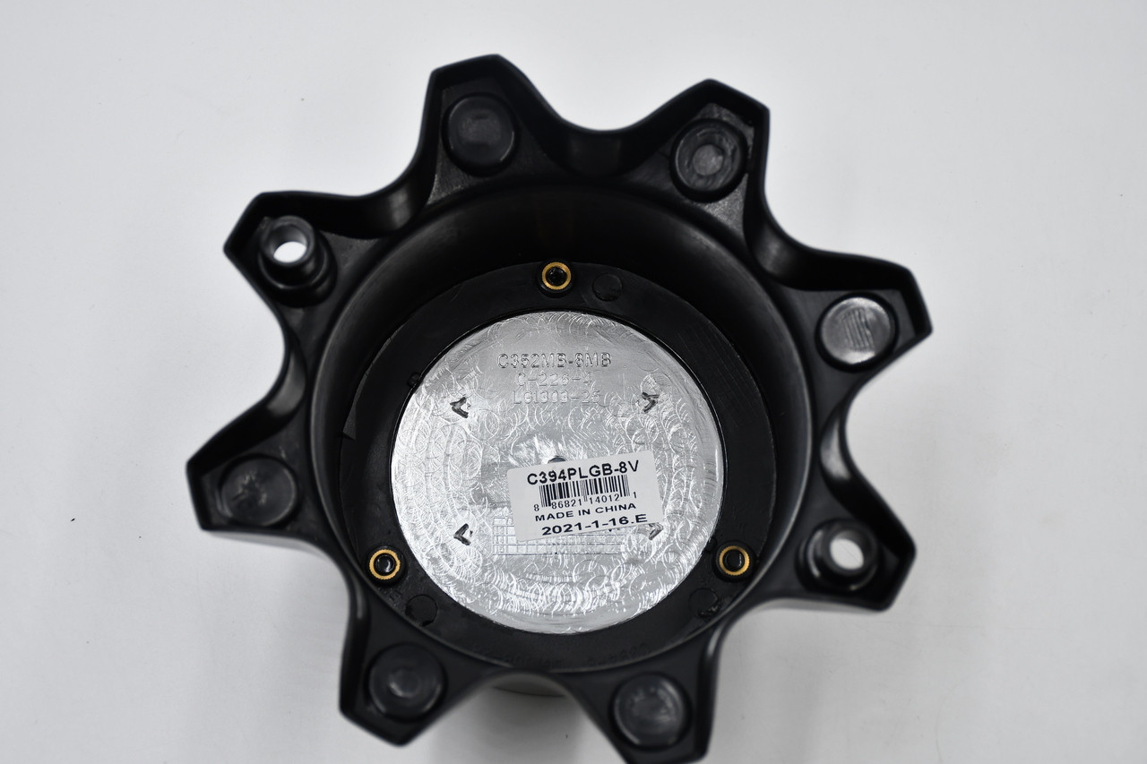 Genuine style Vision 394 395 397 399 center cap in gloss black finish with Vision logo, direct replacement hub cap for aftermarket truck wheels with factory-style fitment.