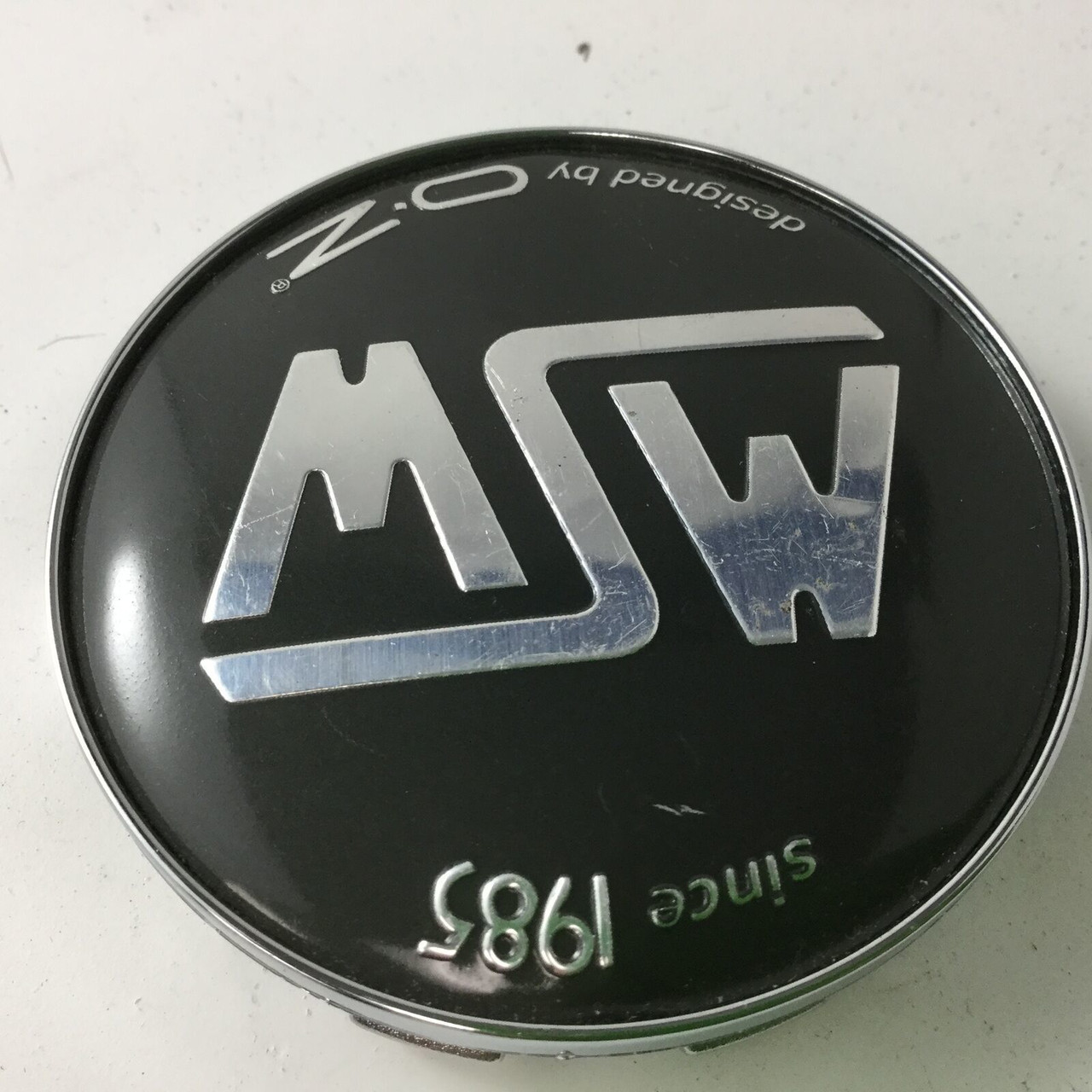 -1MSW by OZ Greyish Black on Chrome Center Cap XC512BW-1 Snap In 2.5" DIA