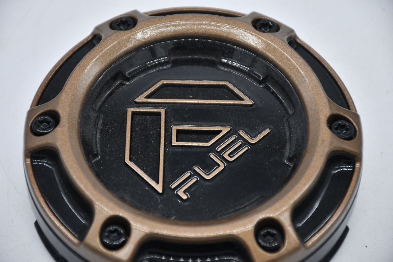 Close-up of the Fuel Off-Road logo on the FC873 Charger wheel center cap, part number 1004-79PBRZ.