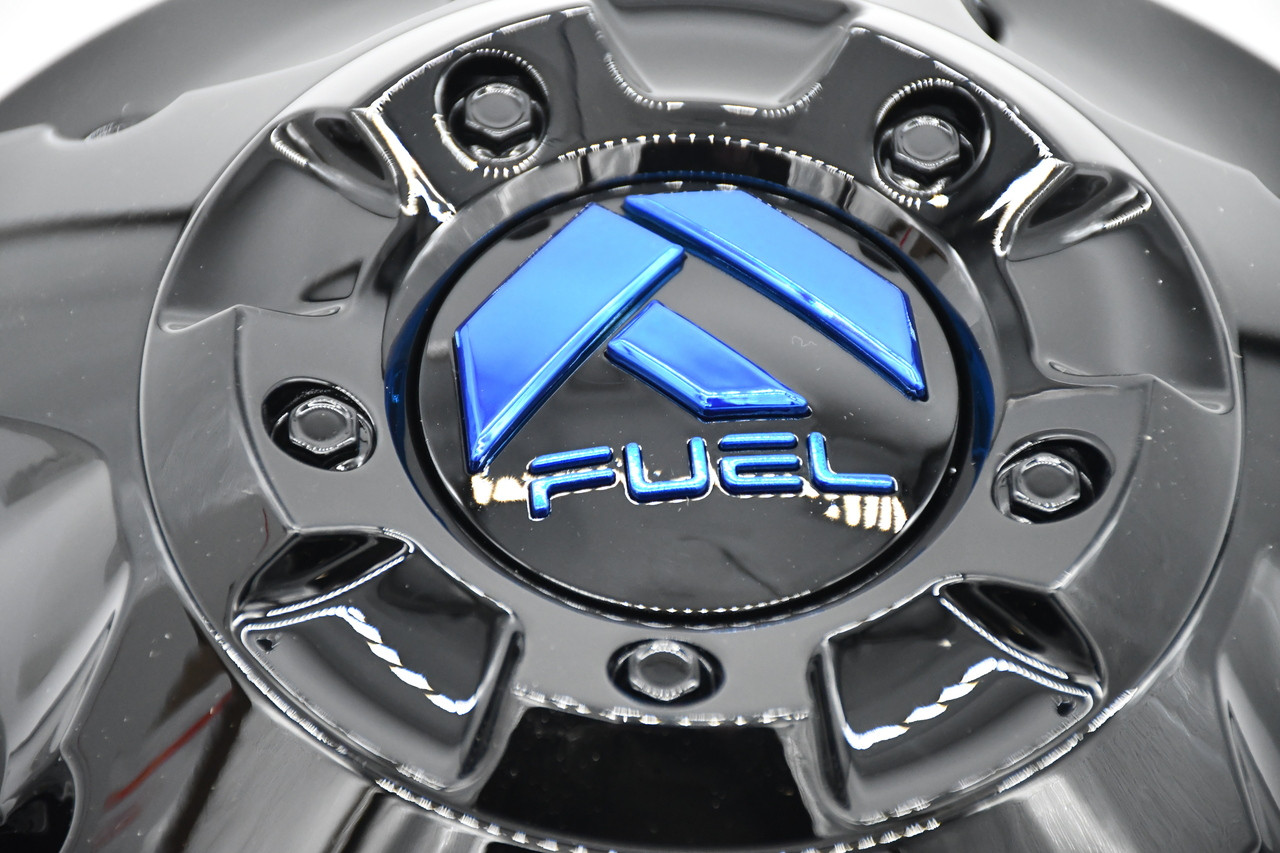 Close-up of gloss black Fuel Offroad wheel center cap with blue logo, part 1003-88GBK