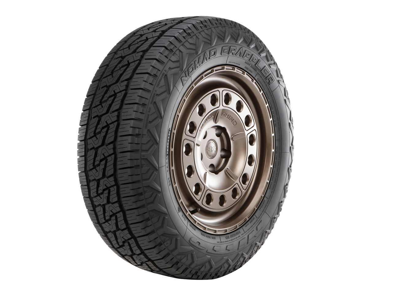 Nitto Nomad Grappler A/T all-terrain tire for CUVs and SUVs featuring rugged tread styling for everyday driving and light off-road adventures