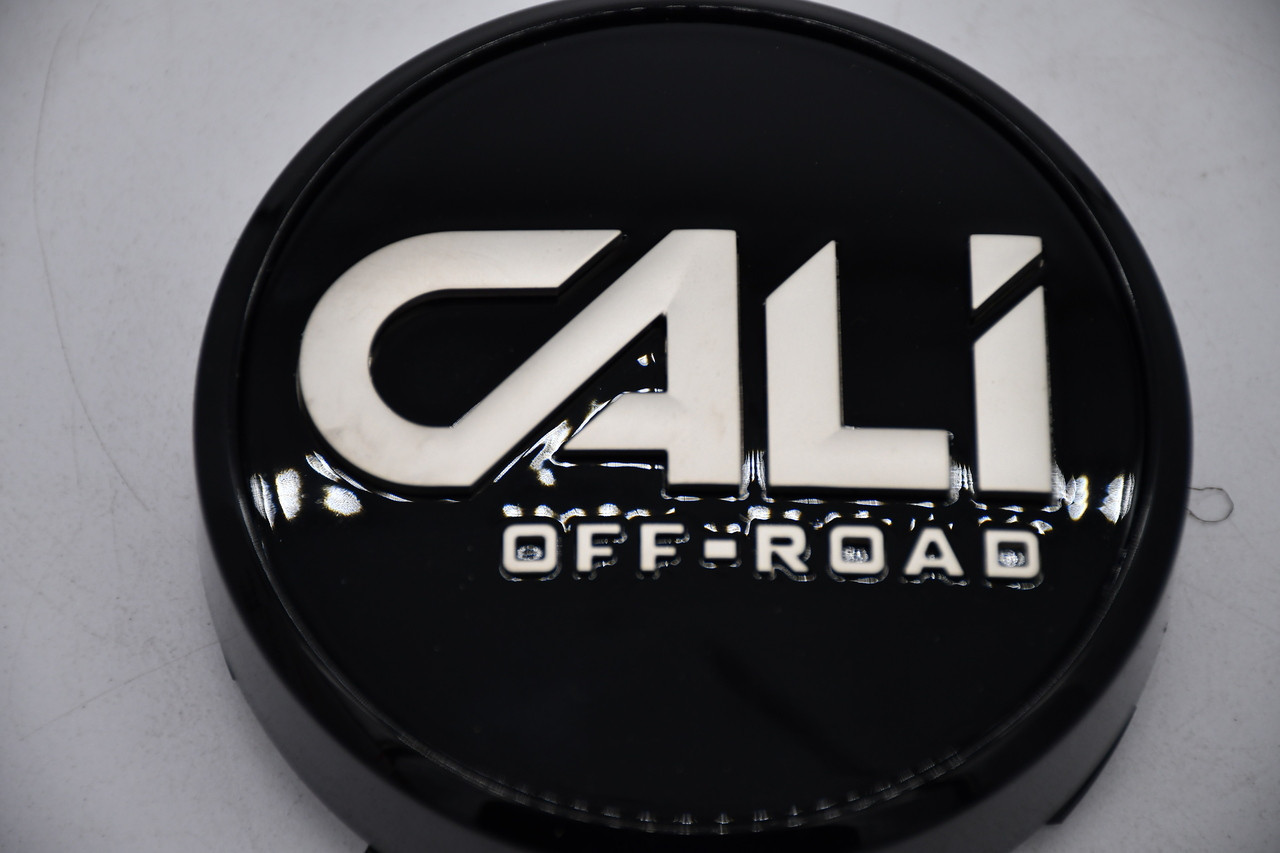 Genuine Cali Offroad C109111B02 gloss black OEM replacement wheel center cap for select 6x5.5 and 6x135 applications. Fits 9108 Switchback, 9110 Summit, 9111 Sevenfold, 9112 Gemini, 9113 Paradox, 9114 Purge, and 9115 Invader wheels.