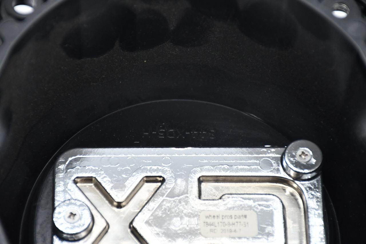 Used XD Series XD844 black wheel hub cap replacement