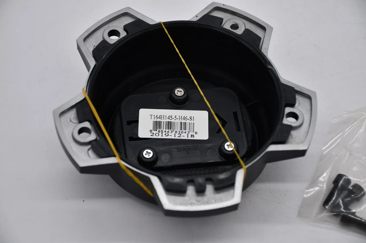 Back of KMC T164H145-5-H46-S1 center cap showing mounting design
