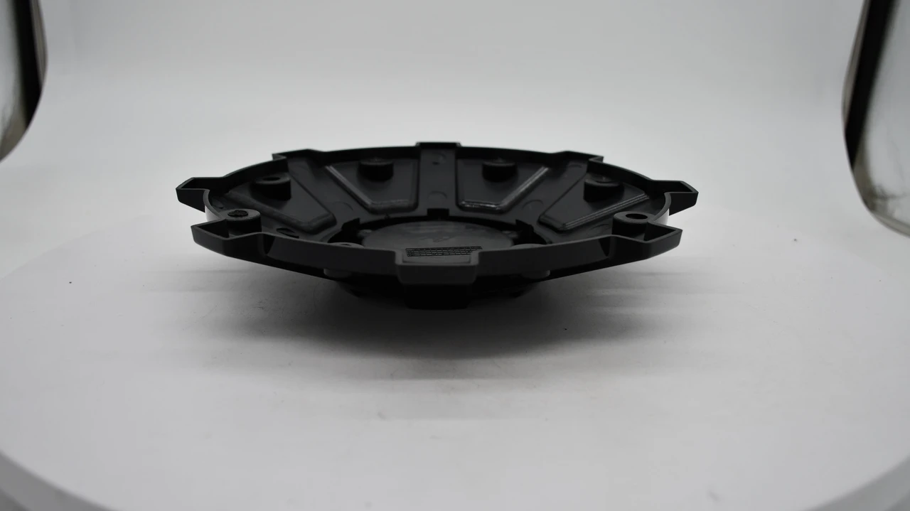 Back of Mayhem C108104B-N center cap showing part number and mounting design