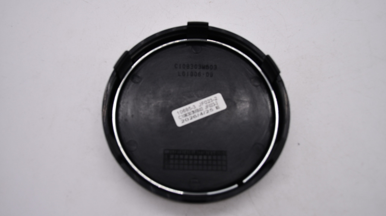 Rear of Mayhem C108303MB03 center cap showing part number and attachment features