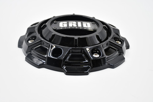 Replacement GRID Off-Road gloss black center cap GD-56-CAP GB for lifted trucks, Jeeps, and SUVs with custom black off-road wheel setups and factory-style fitment.