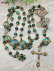 Unique antique-style heirloom rosary featuring solid bronze medals of Archangels Michael, Raphael, and Gabriel, with chrysocolla, turquoise, and lapis lazuli beads for Catholic prayer and devotion.