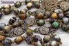 Unique antique-style heirloom rosary with rare purple jasper beads, featuring solid bronze medals of the Sacred Heart of Jesus, Veni Sancte Spiritus, Monstrance, and Angels for Catholic devotion and prayer.