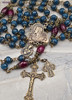 Vintage bronze rosary with blue jade and red agate prayer beads, featuring a Jesus Sacred Heart medallion, perfect for Catholic devotion and meditation.