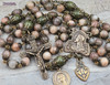 Antique-style heirloom rosary with peach moonstone and green jade beads, featuring solid bronze medals of Jesus, Blessed Virgin Mary, Sacred Heart of Jesus, and Immaculate Heart of Mary for Catholic devotion and prayer.