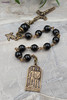 antique-style 1-decade chaplet for police force protection, with handcasted solid bronze medals of Archangel Michael, St Benedict, and the Holy Spirit, crafted with black onyx beads