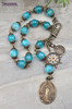 Antique-style nautical Star of the Sea mariners devotional chaplet with solid bronze Stella Maris and Guardian Angel medals, helm wheel charm, knot center, and blue jade beads