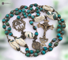 ⚜ Handcrafted Conch Turquoise Inlay Beads with their artisan craftsmanship and intricate inlay work represent the beauty of doing small things with great love as Therese taught and call to mind the solid foundation of faith represented by Mary's pillar
This devotional rosary connects us to the ancient foundation of Marian devotion united with the Little Way's simple trust and the Sacred Heart's infinite love. A perfect gift for those of Spanish heritage, devotees of Our Lady of the Pillar, souls drawn to St Therese's Little Way, lovers of the Sacred Heart, October 12th Pillar feast and October 1st Therese feast, collectors of handcrafted artisan bead rosaries, or hearts drawn to the powerful combination of Mary's foundational apparition, Therese's simple spirituality, and Christ's merciful heart.