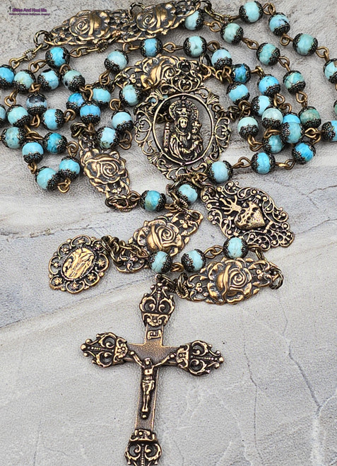 One-of-a-kind antique-style heirloom rosary with solid bronze medals of Crowned Mother Mary with Baby Jesus, Our Lady of Lourdes, the Sacred Heart of Jesus, and roses, crafted with blue opal beads