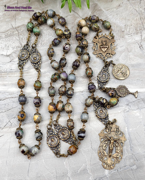 Unique antique-style heirloom rosary with rare purple jasper beads, featuring solid bronze medals of the Sacred Heart of Jesus, Veni Sancte Spiritus, Monstrance, and Angels for Catholic devotion and prayer.