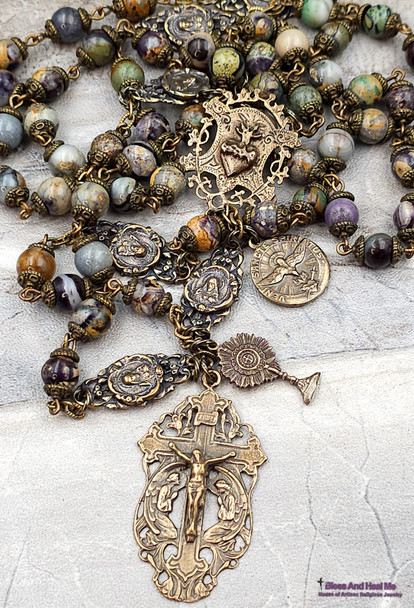 Unique antique-style heirloom rosary with rare purple jasper beads, featuring solid bronze medals of the Sacred Heart of Jesus, Veni Sancte Spiritus, Monstrance, and Angels for Catholic devotion and prayer.