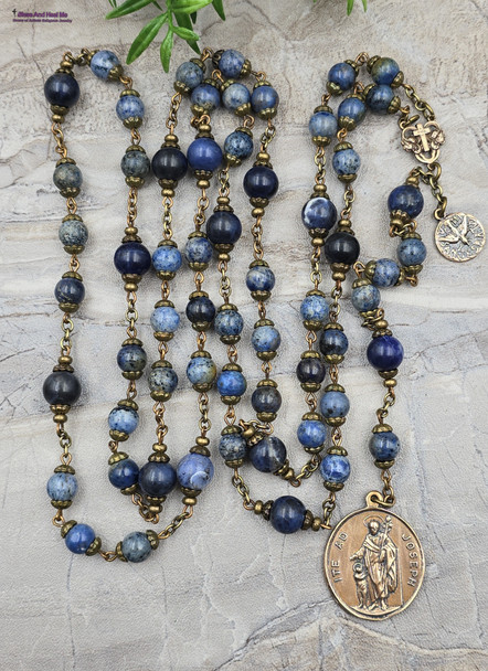 Deepen your devotion to St. Joseph with this exquisite heirloom-quality bronze chaplet featuring St. Joseph with Guardian Angel, Holy Spirit medals, and sodalite and lapis lazuli beads.