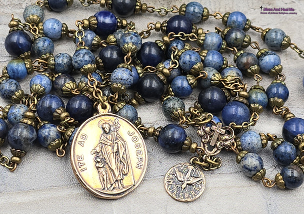 Deepen your devotion to St. Joseph with this exquisite heirloom-quality bronze chaplet featuring St. Joseph with Guardian Angel, Holy Spirit medals, and sodalite and lapis lazuli beads.