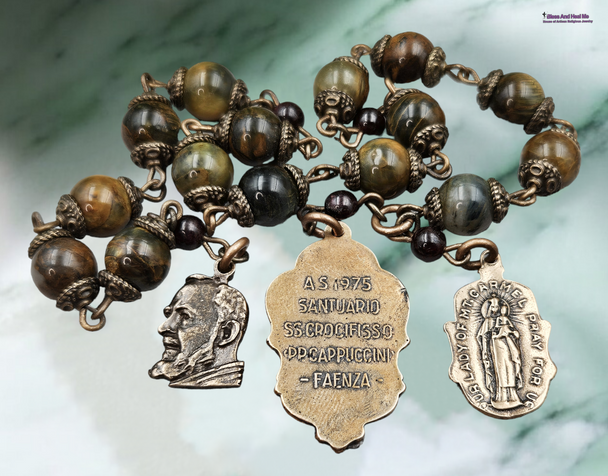 One-of-a-kind vintage-style 15-bead novena chaplet with solid bronze medals of St. Padre Pio, Sacred Heart of Jesus, and Our Lady of Carmel, crafted with smooth Pietersite gemstones and Red Garnet accents.