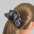 Tuhil Threads Large Grey Royal Micro Satin Scrunchie. Luxurious large satin hair tie for a gentle, stylish hold. Shop Tuhil Threads hair accessories.