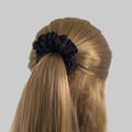 Tuhil Threads Medium Black Royal Micro Satin Scrunchie. Luxurious medium satin hair tie for a gentle, stylish hold. Shop Tuhil Threads hair accessories.