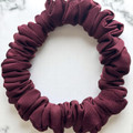Tuhil Threads X-Small Burgundy Royal Micro Satin Scrunchie. Luxurious extra small satin hair tie for a gentle, stylish hold. Shop Tuhil Threads hair accessories