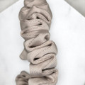 Tuhil Threads X-Small Mink Royal Micro Satin Scrunchie. Luxurious extra small satin hair tie for a gentle, stylish hold. Shop Tuhil Threads hair accessories