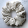 Tuhil Threads Medium Ivory Velvet Scrunchie. Soft, rich medium velvet hair tie for an elegant, gentle hold. Shop Tuhil Threads hair accessories.