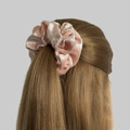 Tuhil Threads Medium Peach Velvet Scrunchie. Soft, rich medium velvet hair tie for an elegant, gentle hold. Shop Tuhil Threads hair accessories.
