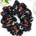 Tuhil Threads Large Black Floral Print Chiffon Scrunchie. Shop Tuhil Threads hair accessories.