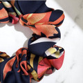 Tuhil Threads Medium Navy & Red Abstract Floral Silky Satin Scrunchie. Shop Tuhil Threads hair accessories.