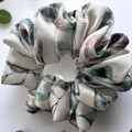 Tuhil Threads Medium Cream Botanical Print Silky Satin Scrunchie. Shop Tuhil Threads hair accessories.