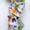 Tuhil Threads Medium White & Rainbow Dinosaur Print Polycotton Scrunchie.Shop Tuhil Threads hair accessories.