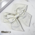 Tuhil Threads Cream Double Layer Royal Micro Satin Sailor Bow (or bow clip/bow hair tie, depending on focus). Luxurious satin hair bow for an elegant, sophisticated accent. Shop Tuhil Threads hair accessories.
