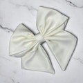 Tuhil Threads Cream Single Layer Royal Micro Satin Sailor Bow (or bow clip/bow hair tie, depending on focus). Luxurious satin hair bow for an elegant, sophisticated accent. Shop Tuhil Threads hair accessories.