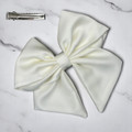 Tuhil Threads Cream Single Layer Royal Micro Satin Sailor Bow (or bow clip/bow hair tie, depending on focus). Luxurious satin hair bow for an elegant, sophisticated accent. Shop Tuhil Threads hair accessories.