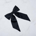 Tuhil Threads Black Royal Micro Satin Long Tail Bow. Luxurious satin hair bow for an elegant, chic accent. Shop Tuhil Threads hair accessories.