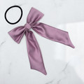 Tuhil Threads Lilac Royal Micro Satin Long Tail Bow. Luxurious satin hair bow for an elegant, chic accent. Shop Tuhil Threads hair accessories.