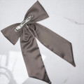 Tuhil Threads Taupe Royal Micro Satin Statement Long Tail Bow. Luxurious satin hair bow for an elegant, stylish accent. Shop Tuhil Threads hair accessories.