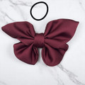 Tuhil Threads small burgundy Royal Micro Satin butterfly bow (10x6cm) showcasing its elegant shape and rich colour. Shop Tuhil Threads hair accessories.