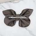 Tuhil Threads small taupe Royal Micro Satin butterfly bow (10x6cm) showcasing its elegant shape and rich colour. Shop Tuhil Threads hair accessories.