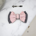 Tuhil Threads Small Royal Micro Satin Classic Bow in a two-tone design with a cool grey bottom layer and a soft pink top layer, neatly tied. Shop Tuhil Threads hair accessories.