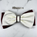 Tuhil Threads Large Royal Micro Satin Classic Bow in a two-tone design with a rich burgundy bottom layer and a cream top layer, neatly tied, measuring 17x10cm. Shop Tuhil Threads hair accessories.