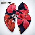 A striking Crimson Bloom Medium Silky Satin Pigtail Bow by Tuhil Threads, measuring 10cm x 12cm. Shop Tuhil Threads hair accessories. A striking Crimson Bloom Medium Silky Satin Pigtail Bow by Tuhil Threads, measuring 10cm x 12cm. Shop Tuhil Threads hair accessories.